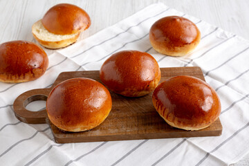 Homemade Brioche Buns Ready to Eat, side view.