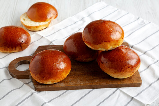 Homemade Brioche Buns Ready to Eat, side view.
