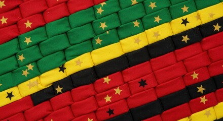 Cameroonian flag displayed in vibrant colors arranged in pattern  