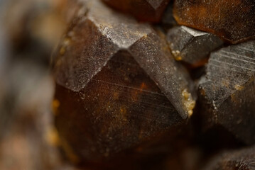 Garnet (andradite, hessanite) crystals. Sinyaya Rechka deposit, Far East, Russia. High magnification microphotograph- photo scale 10X.