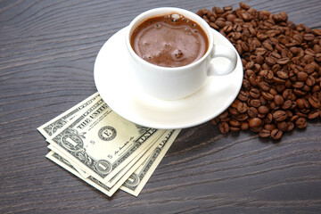 Enjoying a rich cup of coffee with fresh beans and a touch of cash on a wooden table. coffee business