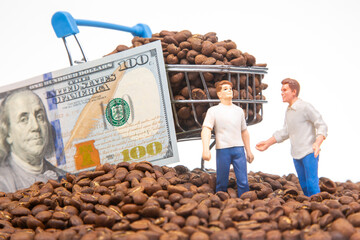 A playful scene with miniature people on a bed of coffee beans, a shopping cart brimming with...