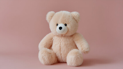 Obraz premium Cute pink teddy bear on pastel background. Soft plush toy for child. Stuffed animal for baby shower gift or nursery decor. Cuddly companion for girl's bedroom.