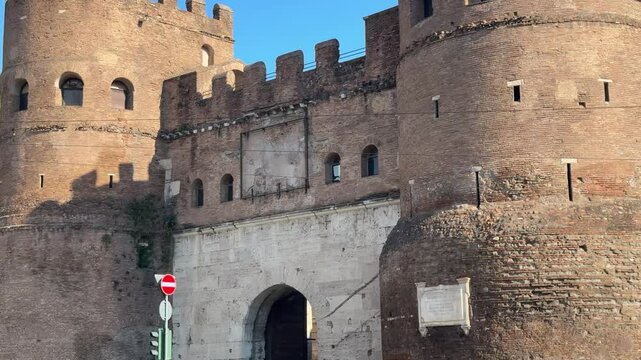 Ancient gate in Rome&rsquo;s Aurelian Walls. Historic stone archway serving as an entrance to the city&rsquo;s defensive walls, showcasing Roman military architecture.

