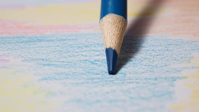 Close-up of Blue Colored Pencil Drawing on Paper with Soft Natural Light