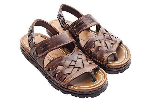 A pair of brown leather huarache sandals with woven straps on a white background close up view