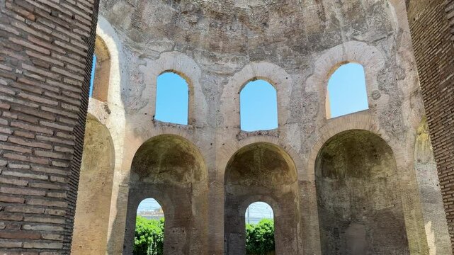 Ruins of the Temple of Minerva in Rome, Italy. Ancient Roman temple remains with stone walls and historical significance near the Forum of Nerva.

