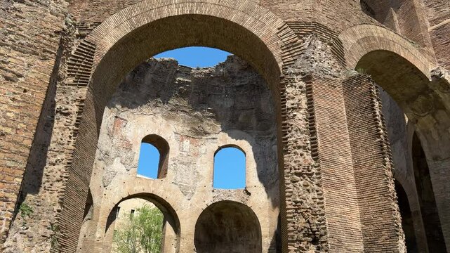 Ruins of the Temple of Minerva in Rome, Italy. Ancient Roman temple remains with stone walls and historical significance near the Forum of Nerva.

