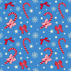 Seamless Christmas pattern with red bows and candy canes on blue background. Season greetings wallpaper.