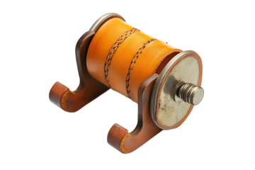 Close up of a leather wrapped object with metal accents and stitching on a black background