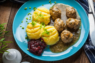 Meatballs with potatoes in dill sauce.