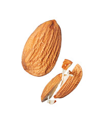 Whole and cracked almonds in the air close up isolated on white background
