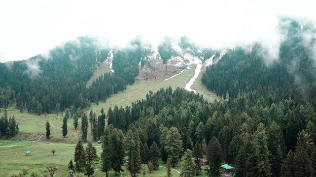 Pahalgam, Kashmir, India - 09 May 2023: Beautiful view of Pahalgam during summer season fresh frozen Himalayas glacier mountains, view of Betab Valley and green fir and pine tree line forest Clip 84