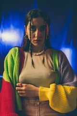 Portrait of a Woman with Braided Hair in Colorful Sweater