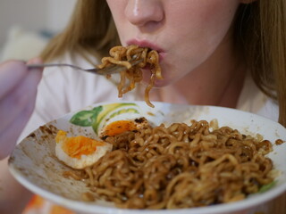 Closse up of girl mouth eating food