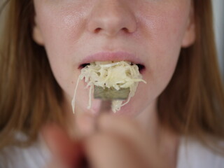 Closse up of girl mouth eating food