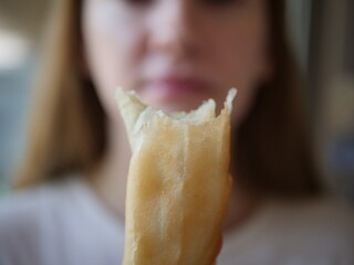 Closse up of girl mouth eating food