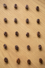 A visually appealing assortment of whole coffee beans on a wooden surface