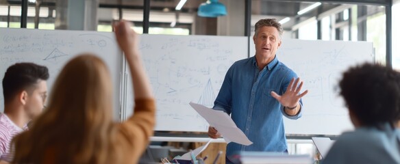 The teacher engaging students in an interactive classroom discussion.