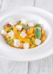 Colorful Salad With Feta, Grilled Peppers, Pineapple And Fresh Mint Leaves