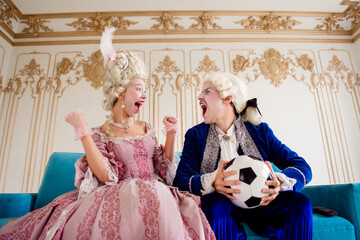 Aristocratic Couple Enjoying a Playful Moment with a Football in a Lavish Baroque-Style Room