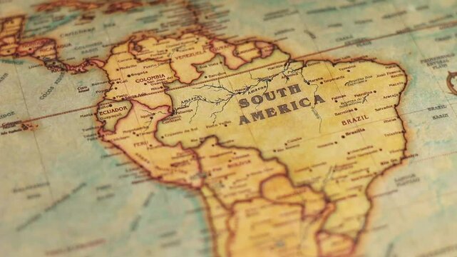 Close up of an old vintage world map with map markings and directions
