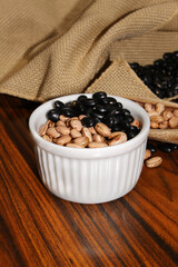 Grains in a white ramekin. Brazilian beans.
