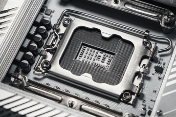 High-resolution macro image showing a close-up view of an empty CPU socket on a modern computer...