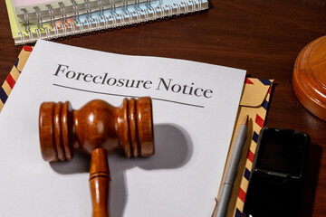 Foreclosure Notice Document with Gavel on Legal Desk
