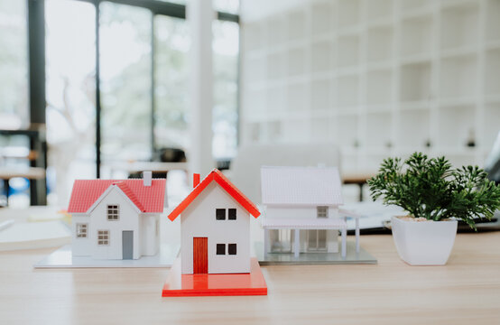 Miniature House Models on Desk