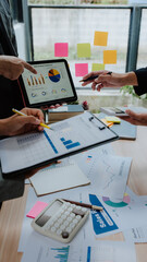 Business Team Analyzing Financial Data and Planning Strategy