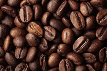 Naklejka premium Close Up of Roasted Dark Brown Coffee Beans Texture