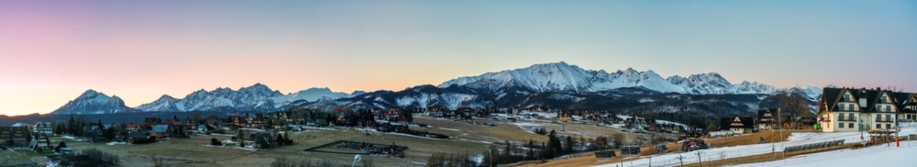 Tatra mountains peak at sunrise seen from Murzasichle village. Winter in Polish mountain region © Pawel Pajor