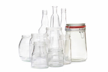 Collection of Empty Glass Jars and Bottles on a White Background