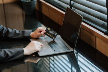 Online Payment with Credit Card on Laptop