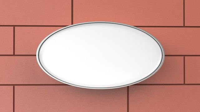 Blank white oval signboard mounted on a brown tiled wall