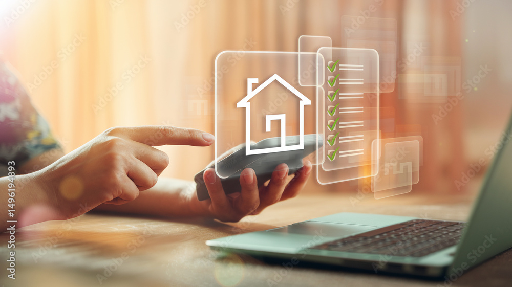 Poster Person using a smartphone with a house icon and checklist overlay next to a laptop computer