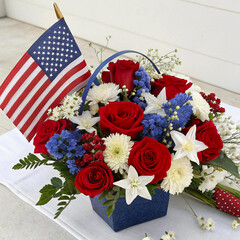 Patriotic Flower Arrangement with American Flag