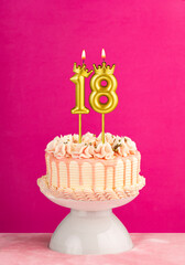 Number 18 birthday candle - Pink celebration cake with drip icing