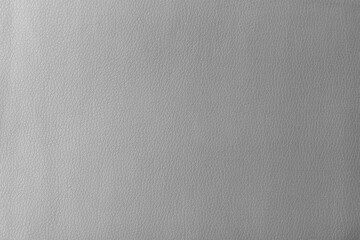 Texture of genuine leather, artificial leatherette grey background