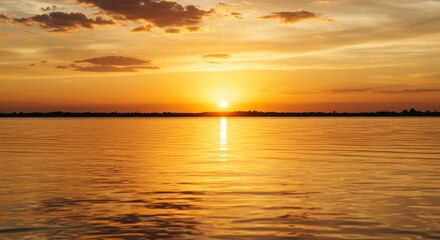 Fototapeta premium Golden Sunset over Calm Water Serene River Landscape at Dusk