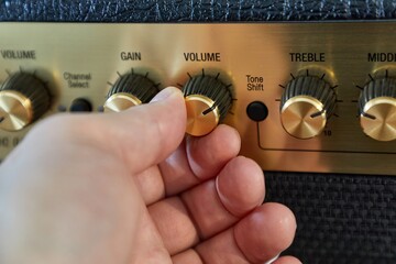 Guitar amplifier closeup, cable connected