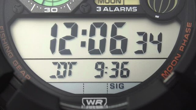 Macro close up of a tactical digital watch face functioning
