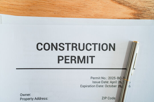 Close up of construction permit. Concept of permit for real estate development.