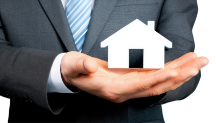 Businessperson holding a house symbol
