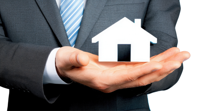Businessperson holding a house symbol