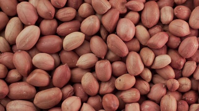Red Peeled Peanut Close Up Background

