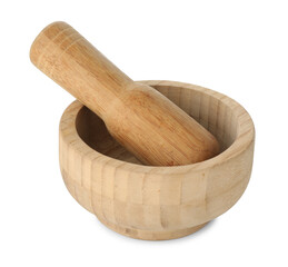 Wooden mortar with pestle isolated on white