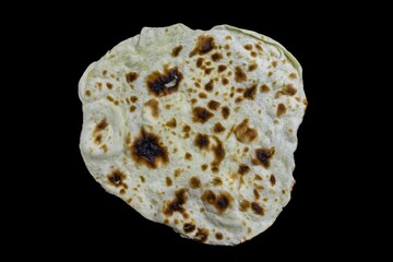 The most traditional and classic shawarma prepared in Syrian bread or pita bread grilled on a stone