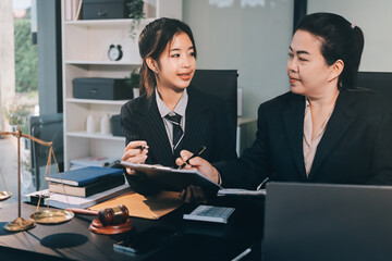 Judge gavel with Justice lawyers, Business woam in suit or lawyer working on a documents. Legal law, advice and justice concept..